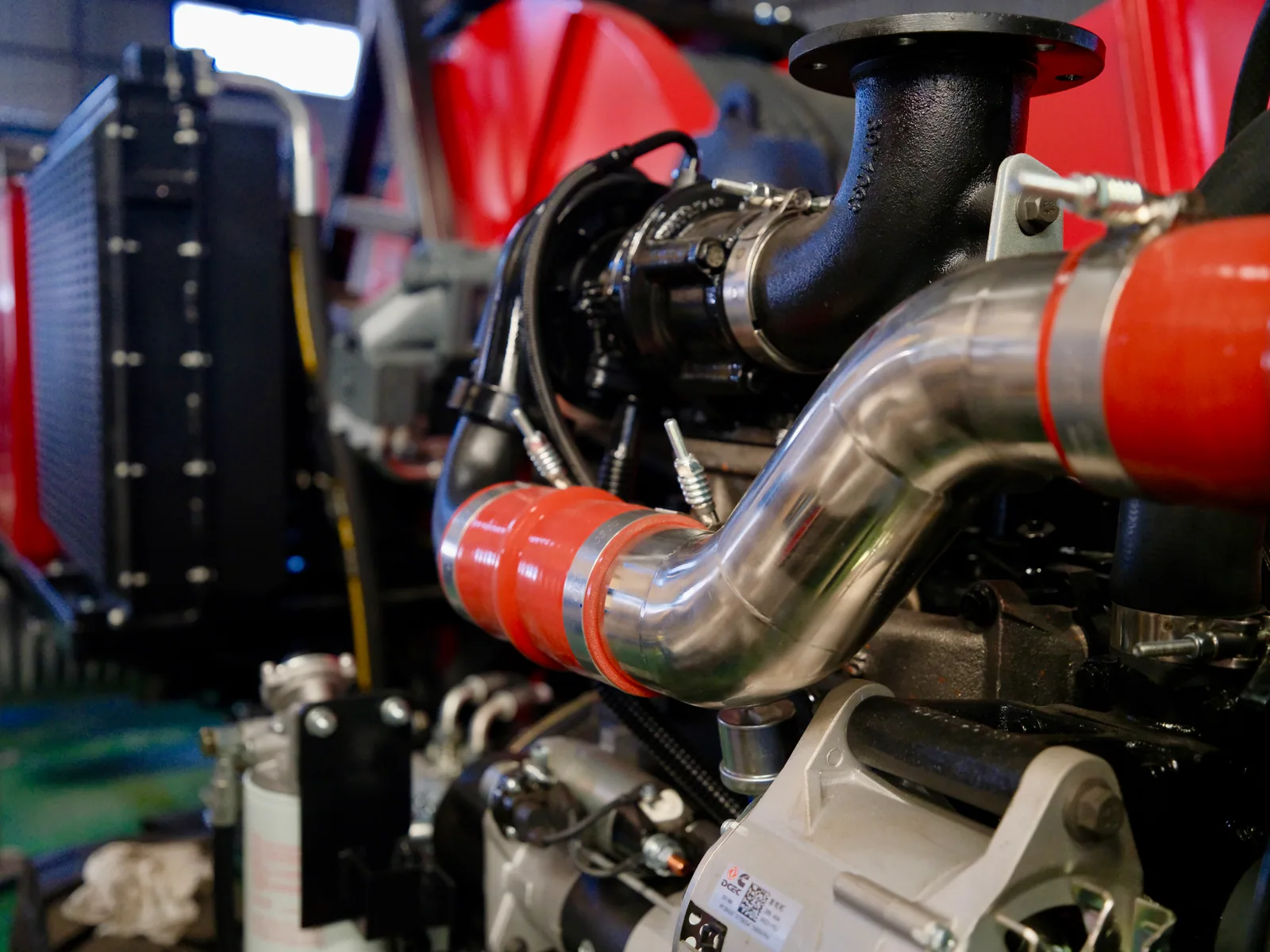 Sculptural curved metal engine piping in actual GALAXY equipment